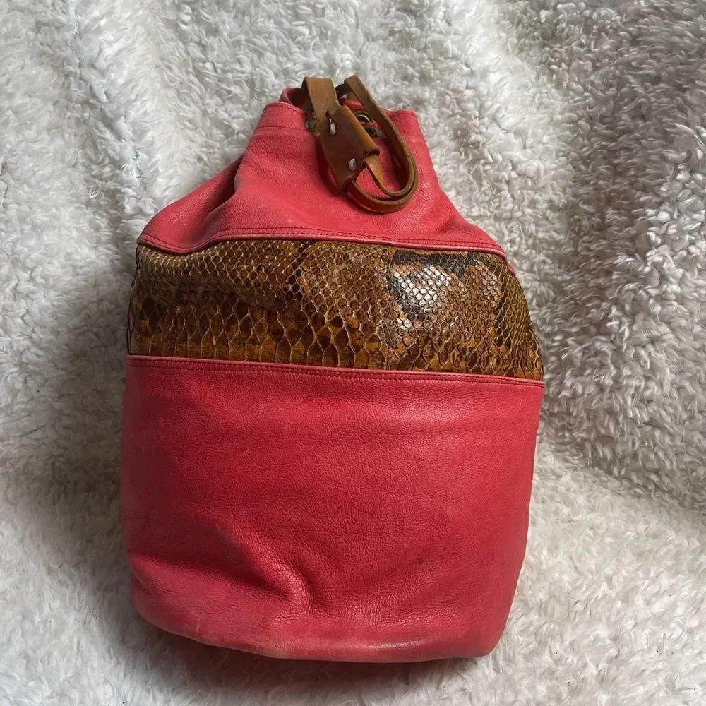 Leather orange and Brown snake skin print  Xlarge bucket bag sling back tan trap